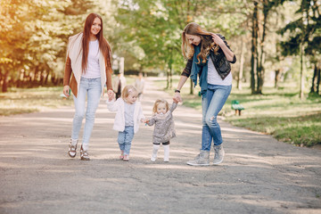young family walking in the park