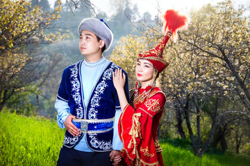 Kazakh couple in ethnic costume - obrazy, fototapety, plakaty