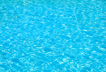 swimming pool with sunny reflections