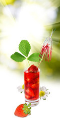 Image of strawberry cocktail against the sun close up