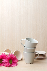 Coffee cups collection on wooden background
