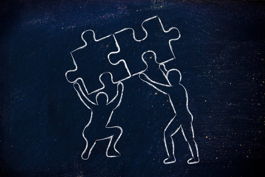 people lifting matching pieces of puzzle