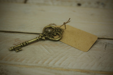 Old keys on a rustic background