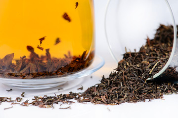 close-up of spilled black tea Golden Nepal Ilam, shallow DOF