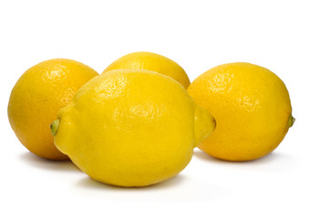 Fresh organic lemons, isolated on white background.
