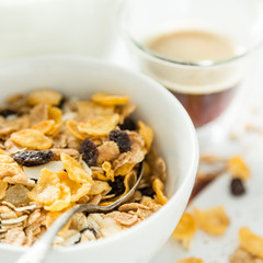 Breakfast - muesli and fruits on white background