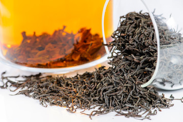 close-up of Ceylon leaf tea Sudugahahena (Orange Pekoe 1) brewed - obrazy, fototapety, plakaty
