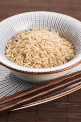 Raw brown rice in a bowl