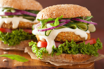 veggie carrot and oats burger with cucumber onion tomato