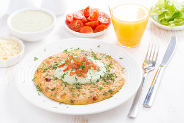 healthy breakfast - omelette with carrots, tomatoes 