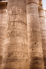 A sandstone column in Egypt.  columns covered in hieroglyphics