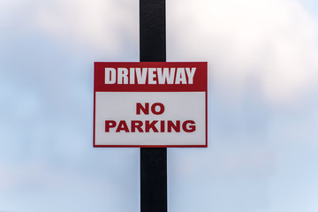 No Parking Sign with 'Driveway' waring