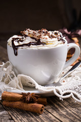 Cup of hot cappuccino with homemade oat cookies for breakfast.