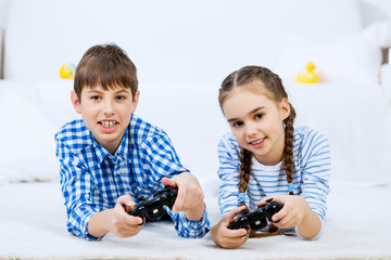 Kids playing game console