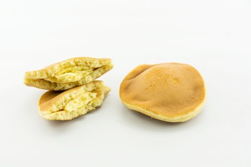 Close up of Dorayaki - twist, delicious sweets of Japanese Traditional Dessert : Dorayaki isolated on white
