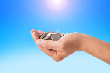 Fototapeta premium hand with coin