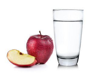 Glass of water and apple isolated on white background