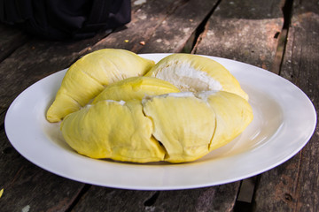 Durian peeled dish on wooden table