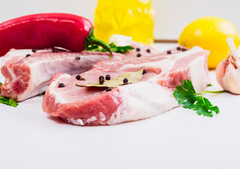 two pieces of beef steak, greens, garlic, lemon, red pepper and sunflower oil or olive oil, and bay leaf. set products