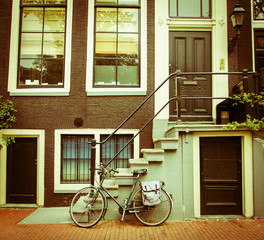 Fototapeta na wymiar Bike parking on the sidewalk in front of the house