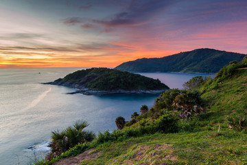 Fototapeta na wymiar Beautiful sunset in promthep cape is a mountain of rock that extends into the sea in Phuket, Thailand
