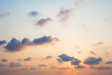 Sunset sky with clouds and sunlight