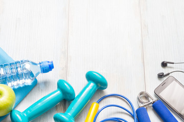 Fitness diet and healthy lifestyle concept background with sport gear
