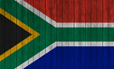 south african flag on wood texture background