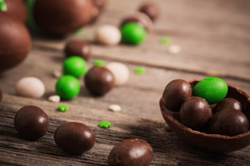 Chocolate Easter Eggs Over Wooden Background