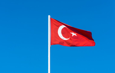 flag of Turkey on blue sky