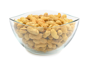 crude peanuts isolated on white background