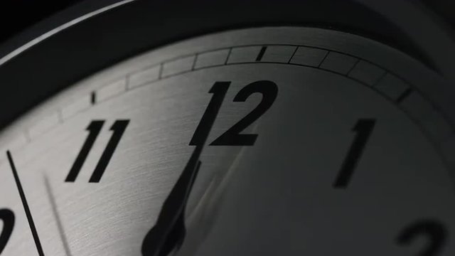 Slow zoom in as the clock strikes 12 o'clock