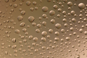 macro shot of liquid droplets with reflection. color background with water drops texture. gradient color