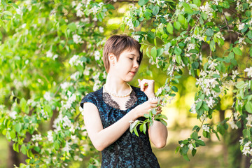 portrait of pretty young woman in spring