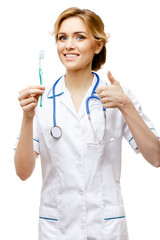 Woman doctor standing on white background