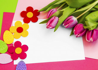 Easter holiday greeting with tulips and easter eggs decorations