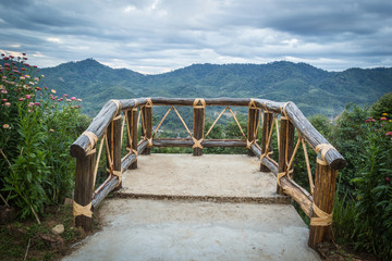 Fototapeta na wymiar Wooden balcony for scenic of terraced rice field at Ban Na Gian,