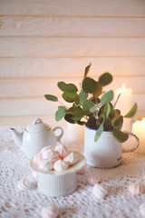 Tea time. Lunch with hot tea and diet dessert white and pink mar