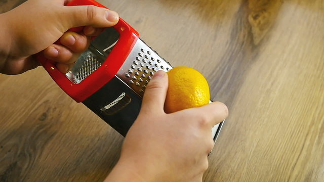 Lemon zest being grated, slow motion