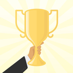 The winner of the cup in his hand.