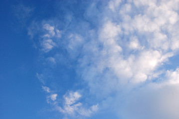 Naklejka na ściany i meble clouds in the pure blue sky background