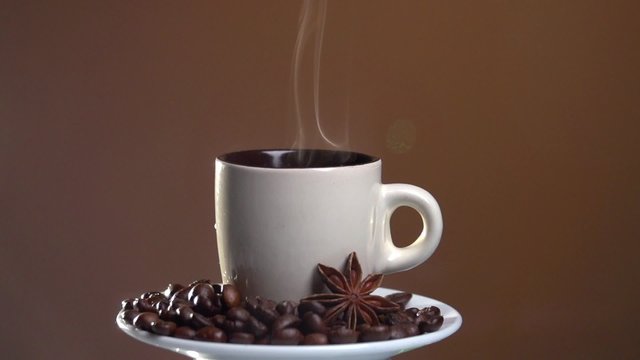 Coffee. Cup of hot beverage with Steam. Slow motion 240 fps. 