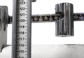 scales in the doctor's clinic to measure the weight and height o
