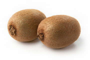two kiwi fruit on white background