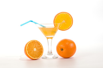 Orange juice in a glass with a straw to drink