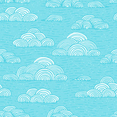 Fototapeta na wymiar Abstract vector seamless gentle pattern with clouds. Colorful stylized hand drawn cloudy sky texture on light background