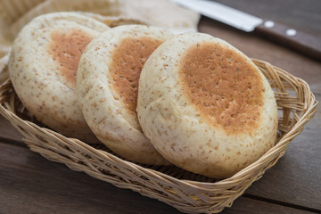 Whole wheat english muffins in basket