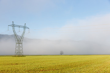 Big electricity high voltage pylon with power lines