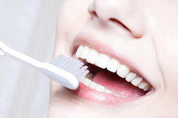 Beautiful woman with toothbrush. Dental care