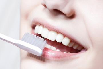 Beautiful woman with toothbrush. Dental care